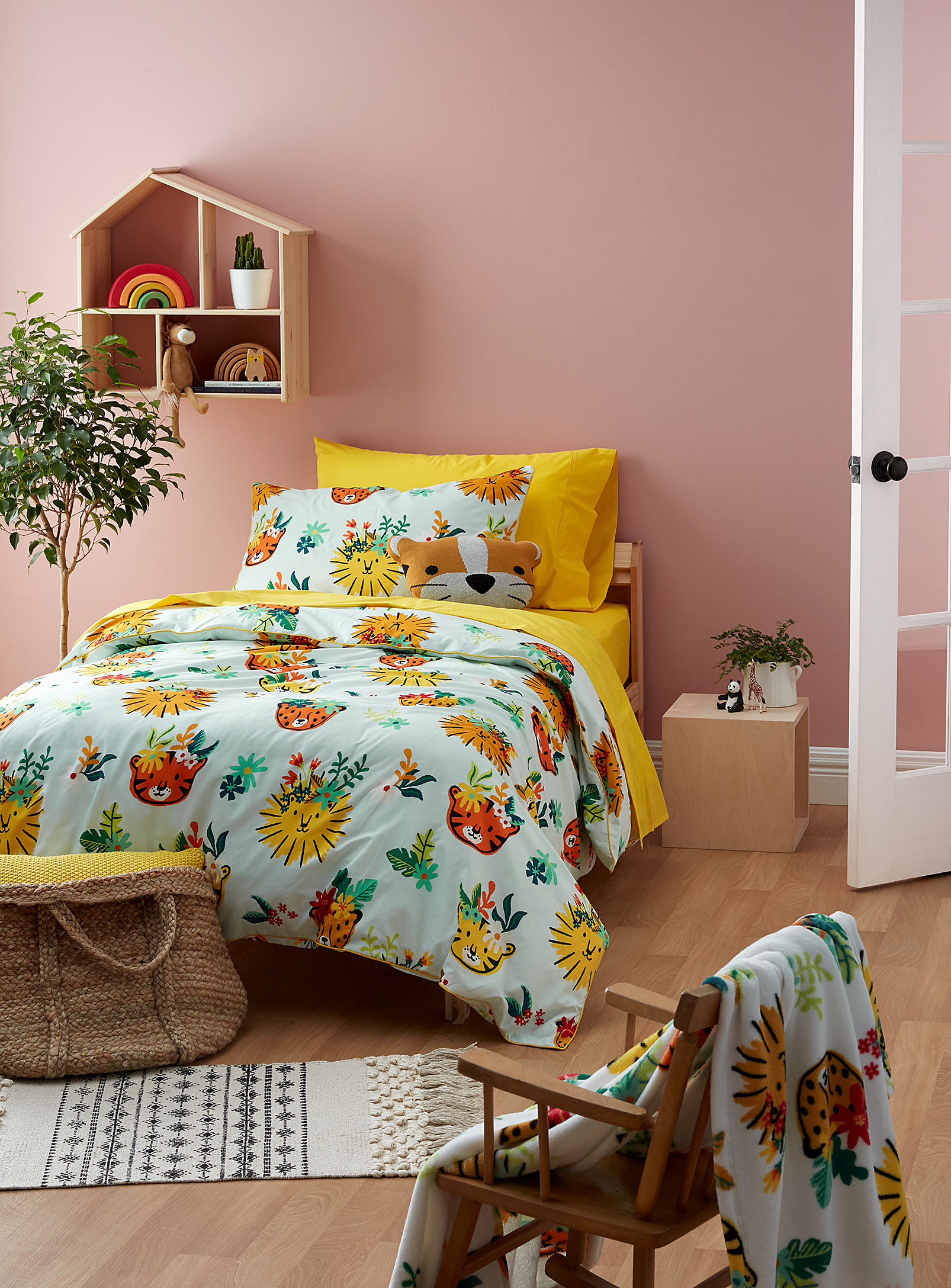 A duvet set with illustrated tiger faces on it
