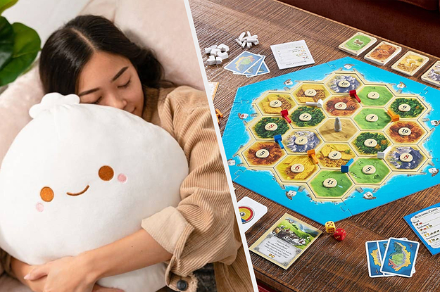 a model cuddling a stuffed dumpling, to the right: a game of settlers of catan