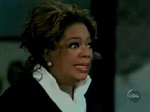 Oprah Winfrey gritting her teeth 