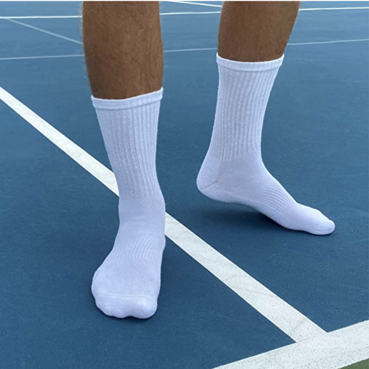 Model in white socks that hit mid-calf 