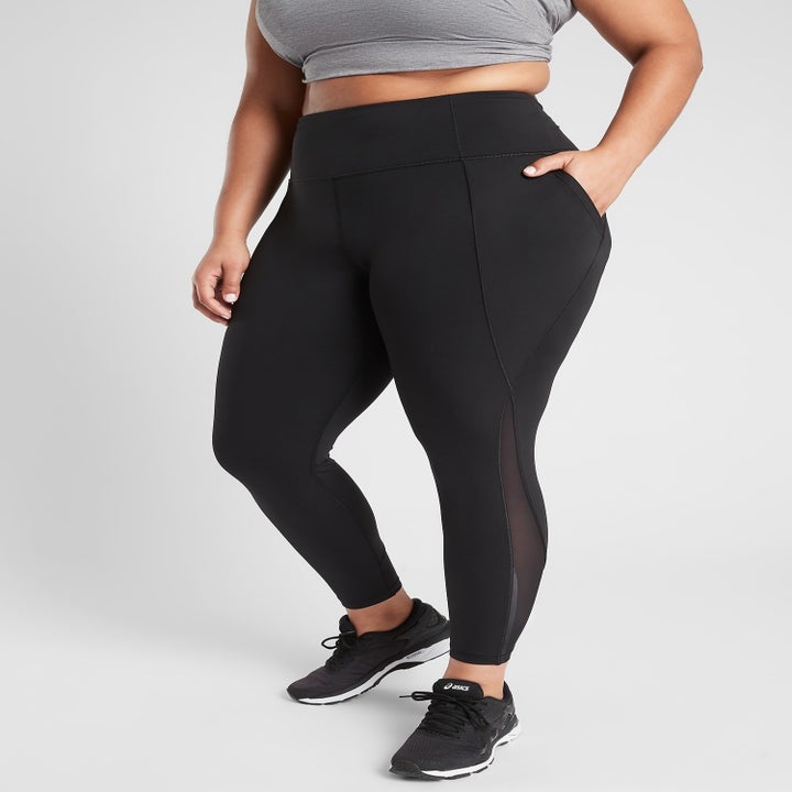 A model wearing the tights in black