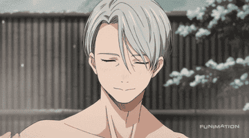 A closeup of Victor smiling and then winking at the camera