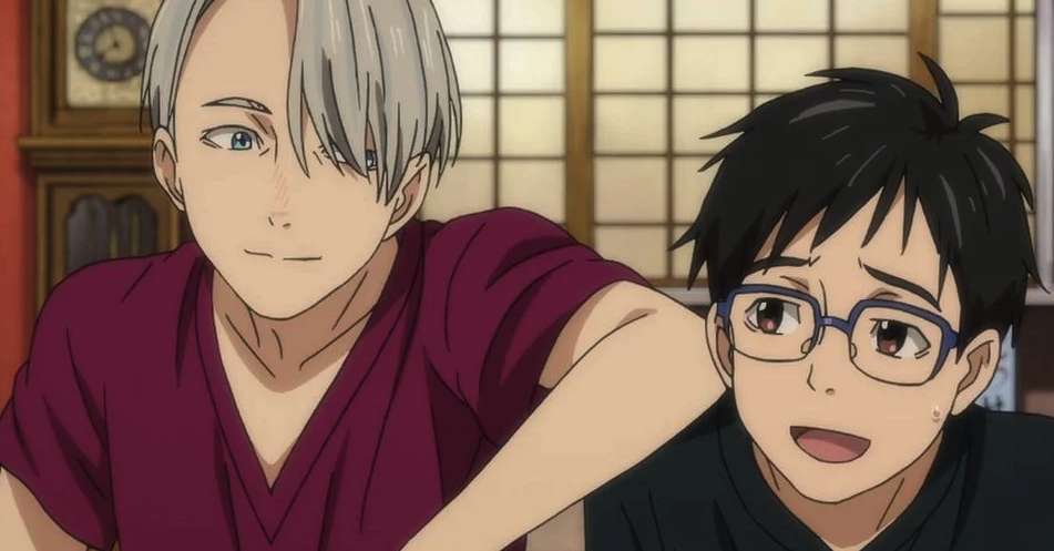 Yuri and Victor sitting next to each other, laughing and smiling