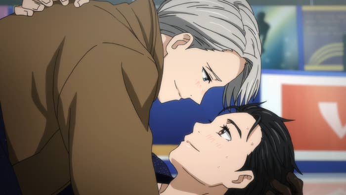 Yuri and Victor lying down and looking at each other