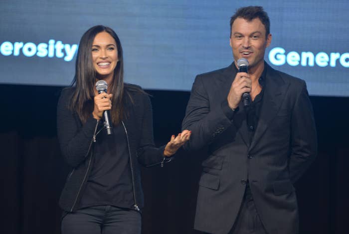 Actors Megan Fox and Brian Austin Green speak on stage at the 6th Annual Night of Generosity Gala presented by generosity.org at the Beverly Wilshire Four Seasons Hotel on December 5, 2014 in Beverly Hills, California