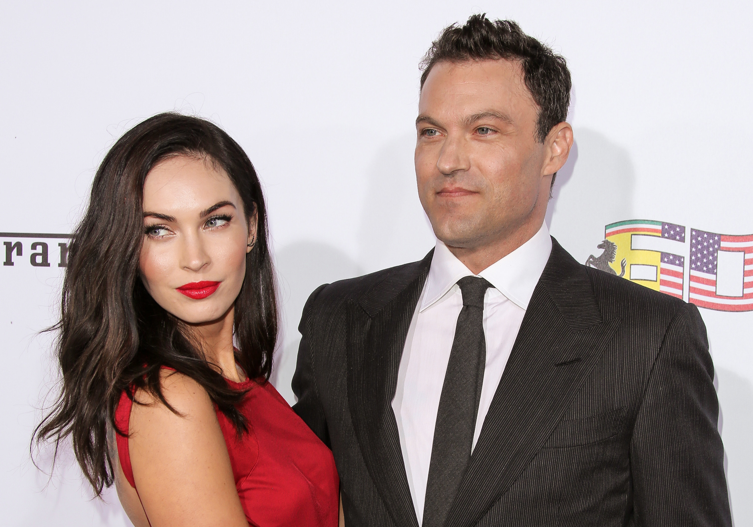 Actors Megan Fox (L) and Brian Austin Green (R) attend Ferrari&#x27;s 60th Anniversary In The USA Gala at the Wallis Annenberg Center for the Performing Arts on October 11, 2014 in Beverly Hills, California