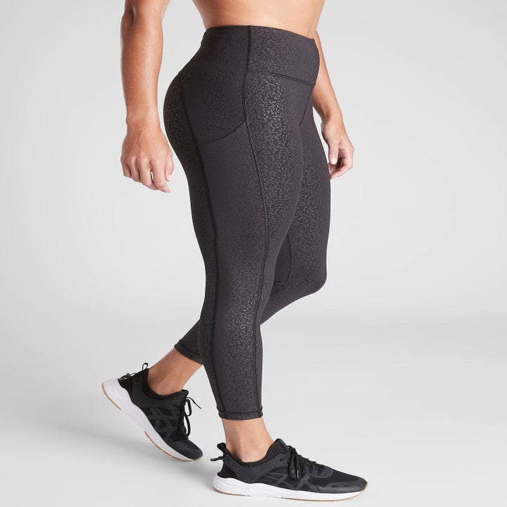 A model wearing the tights in black