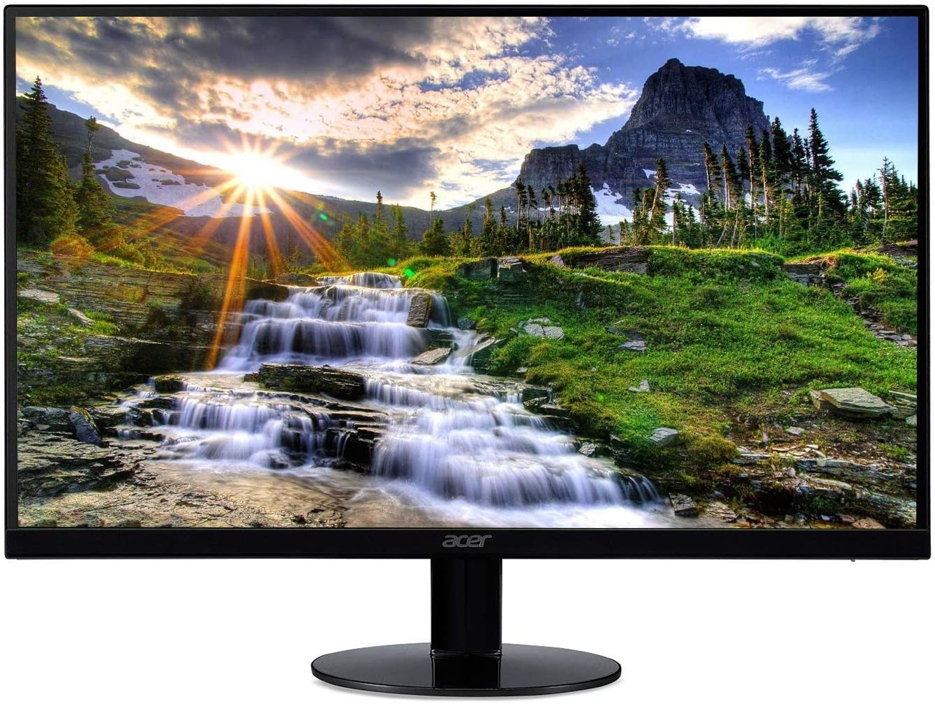 The black acer monitor with a bright nature scene on it 