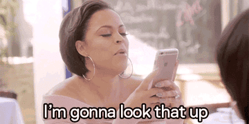 A Basket Ball Wives gif with one cast member saying &quot;I&#x27;m gonna look that up&quot;