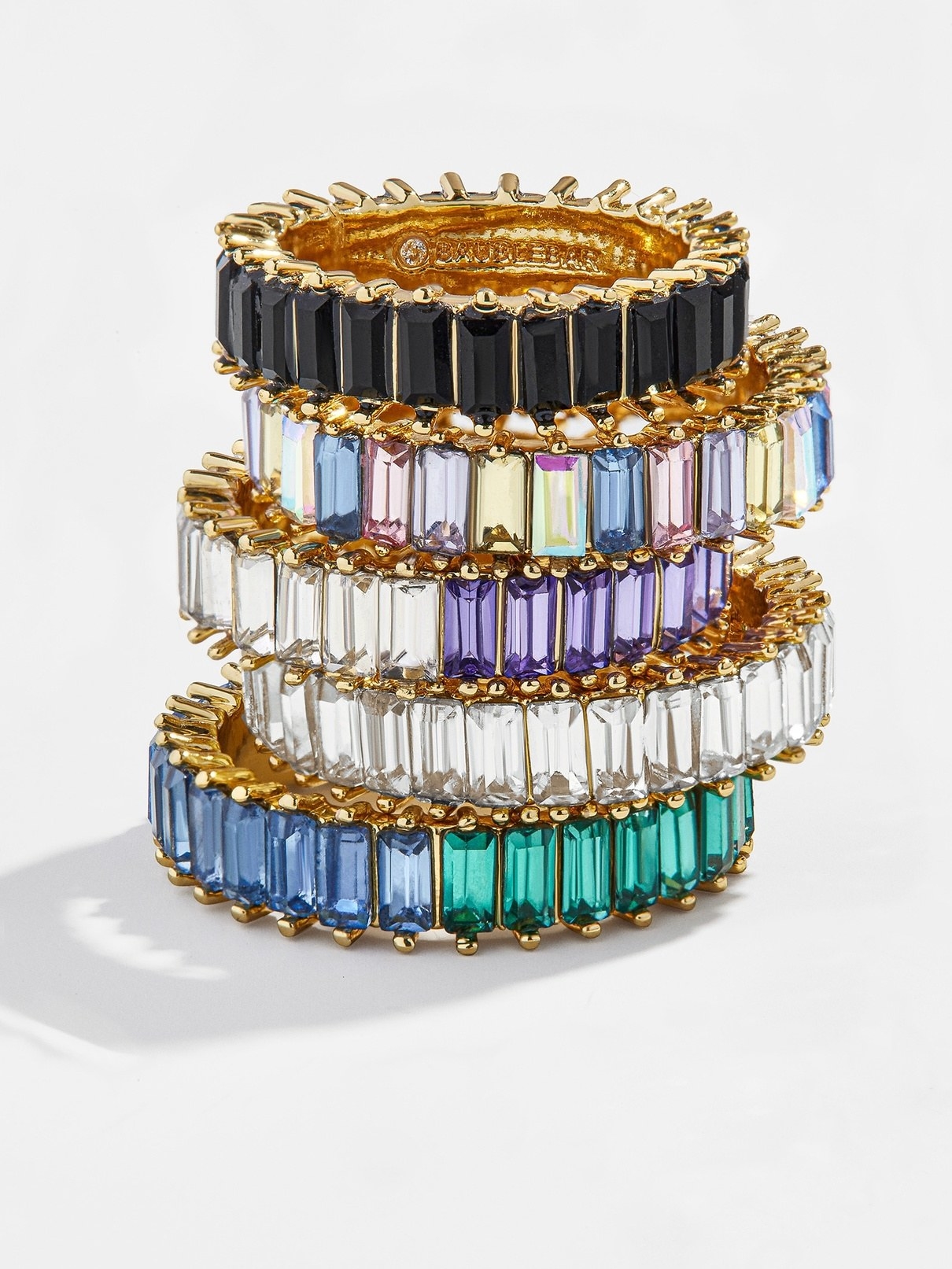 a stack of jeweled rings