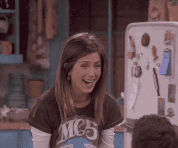 a gif of rachel green from friends excited