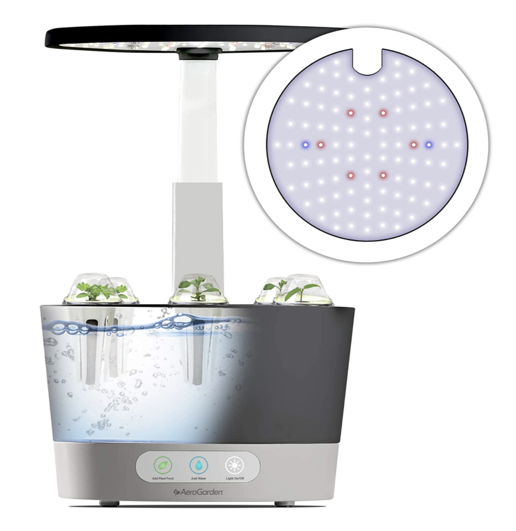 The hydroponic garden which has an LED light panel and only three symbols/buttons on the control unit