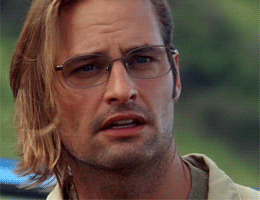 A gif of Sawyer from Lost slowly lowering his glasses
