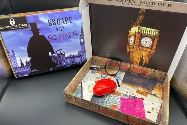 a box filled with sleuthing tools and clues