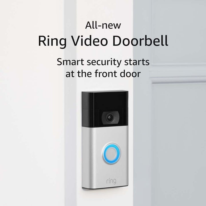 Ring video doorbell mounted on front door