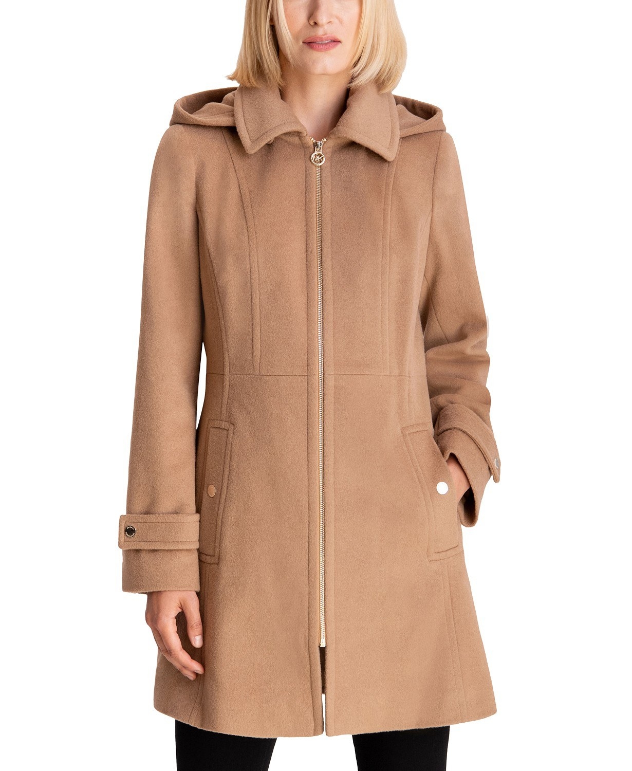 model wearing Michael Kors hooded coat in dark camel