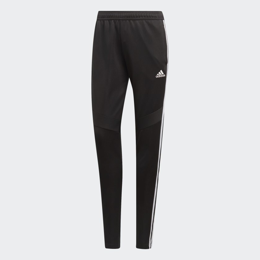 the black track pants with the adidas logo and stripes down the side