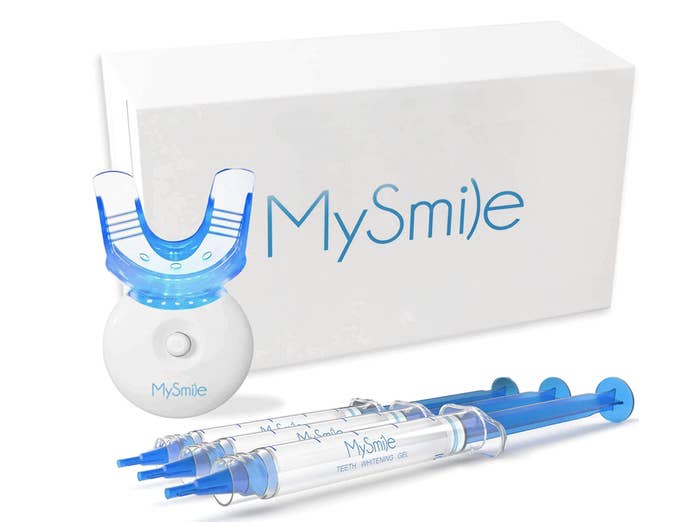 The MySmile kit with light, mouth guard, and gel syringes with a box