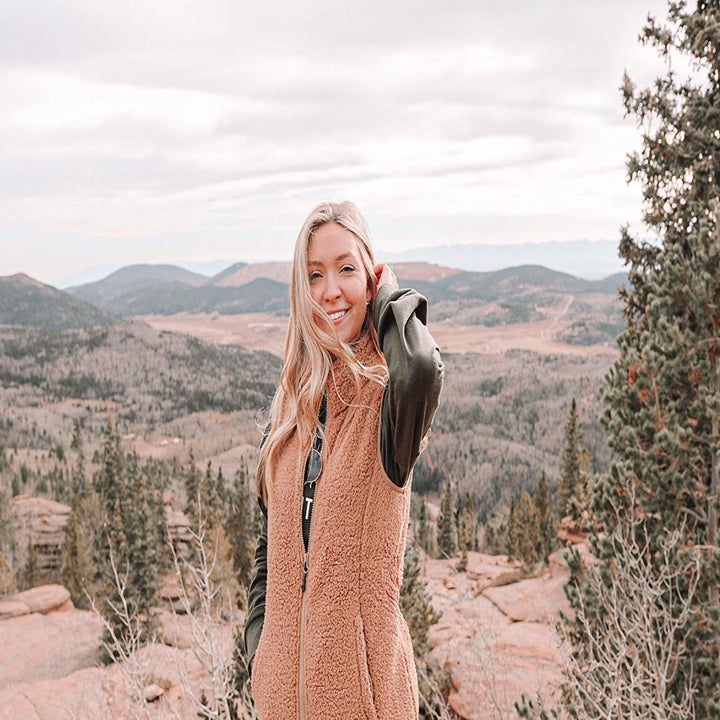 Reviewer wearing the tan version