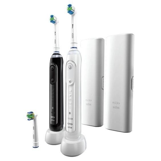The black and white electric toothbrushes with replacement heads