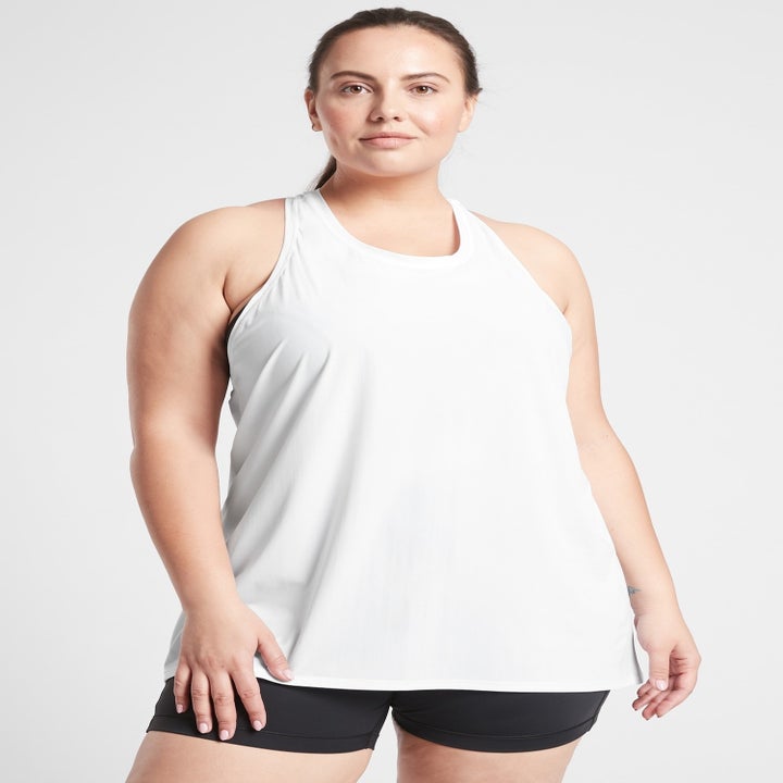 A model wearing the tank top in white