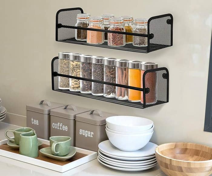 The mounted spice racks in use