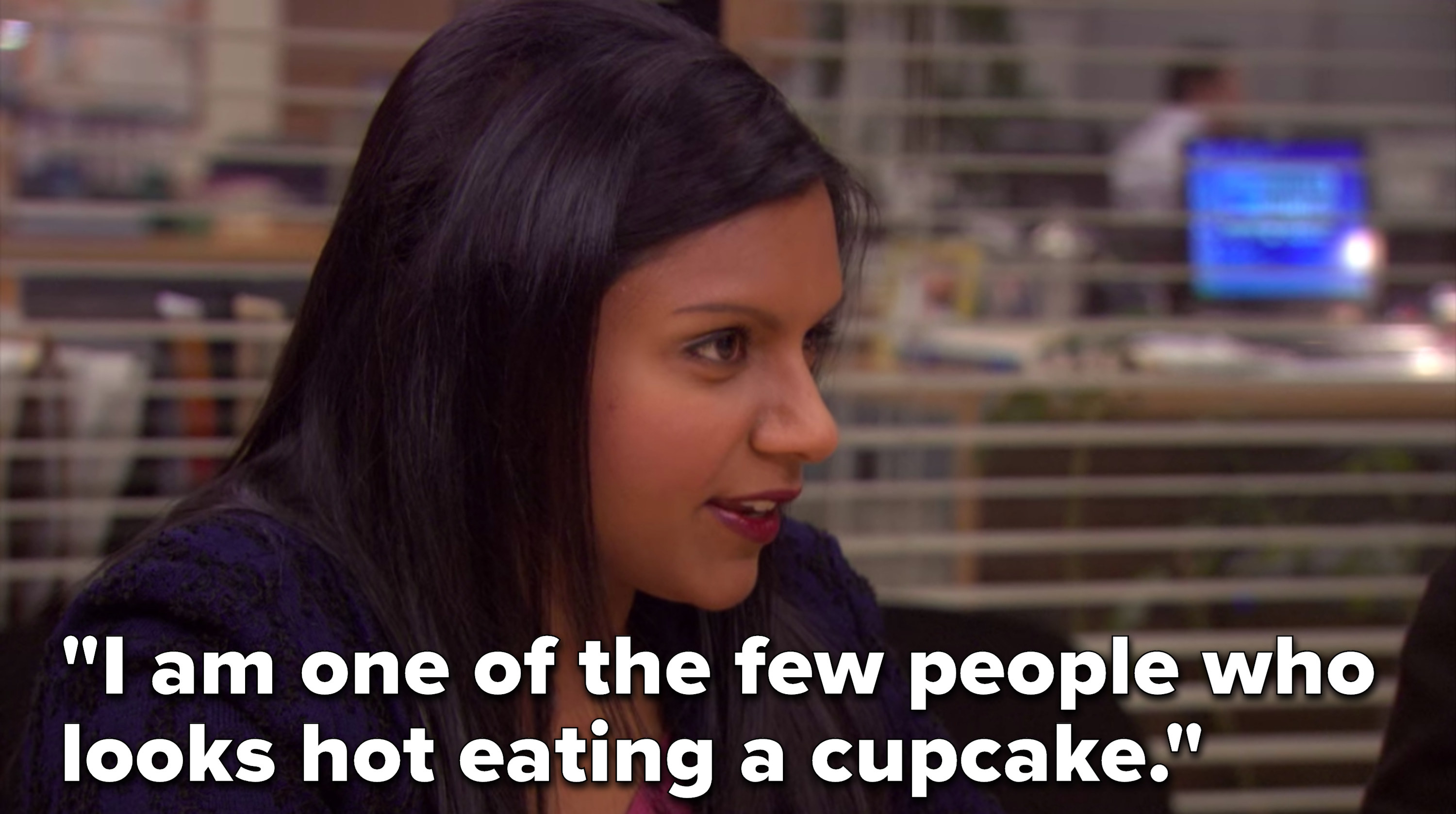 Kelly says, “I am one of the few people who looks hot eating a cupcake&quot;