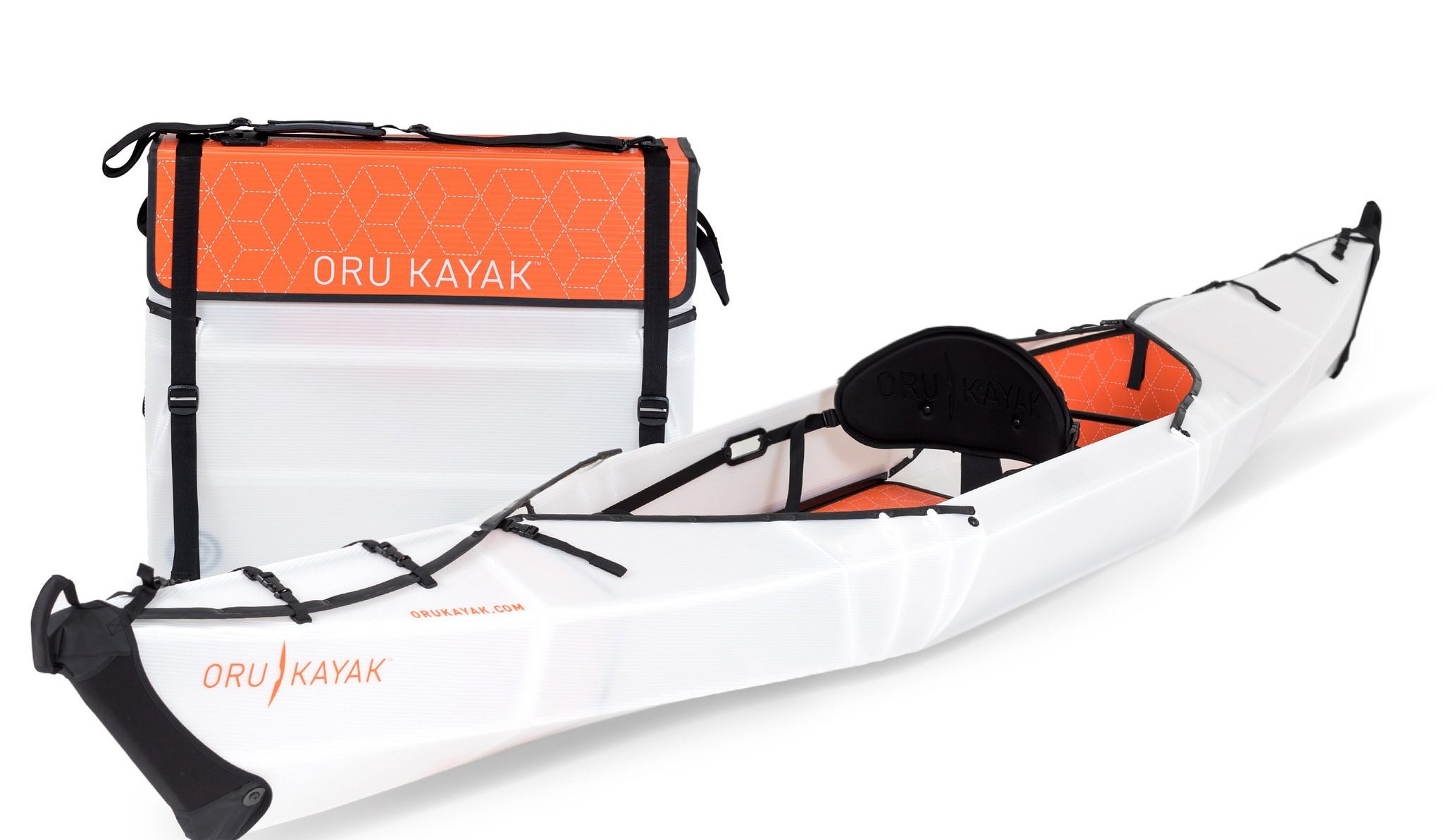 the full-size kayak beside a folded up version with a carrying strap. 