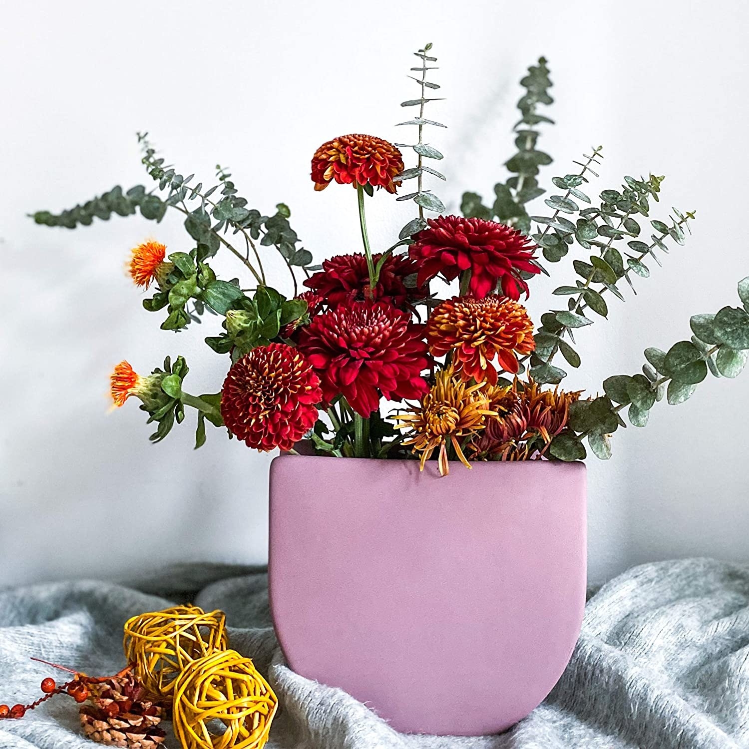 Matte pink vase with round bottom and square edge top 