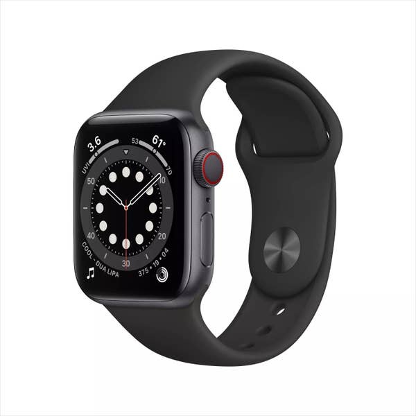 The Apple Watch in black showing a clock, the song playing, the Activity tracker, the weather, and the UVI