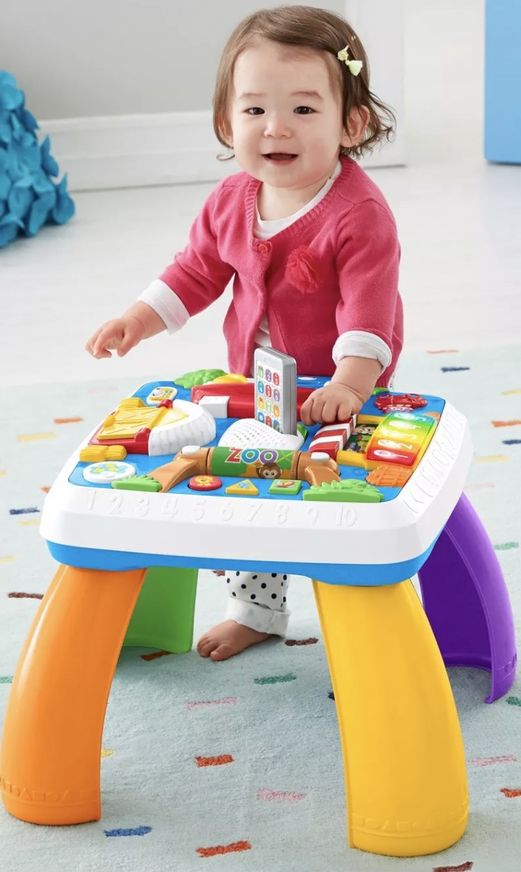 Child playing with the interactive table