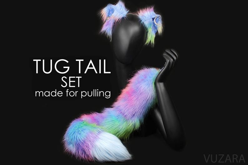 a manikin wearing the ears and holding onto the tail