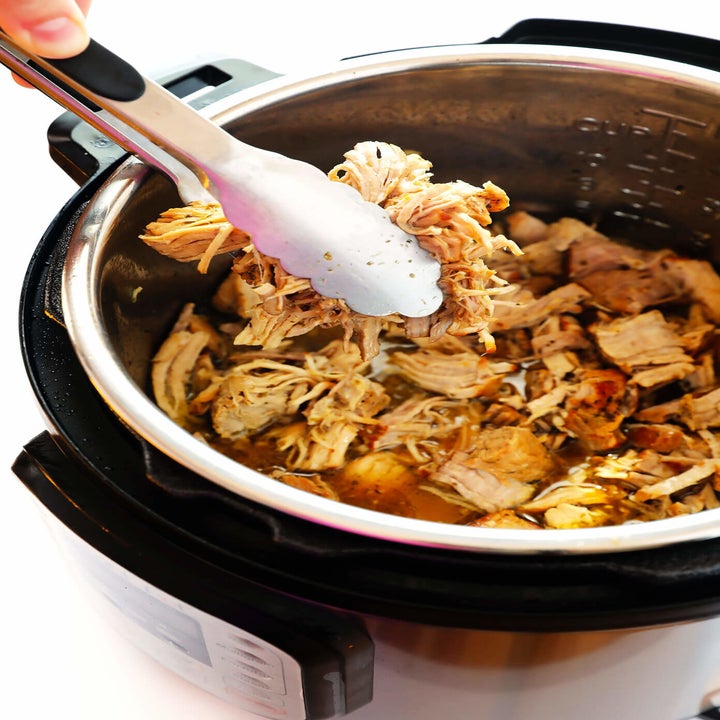 Shredded pork carnitas in an Instant Pot.