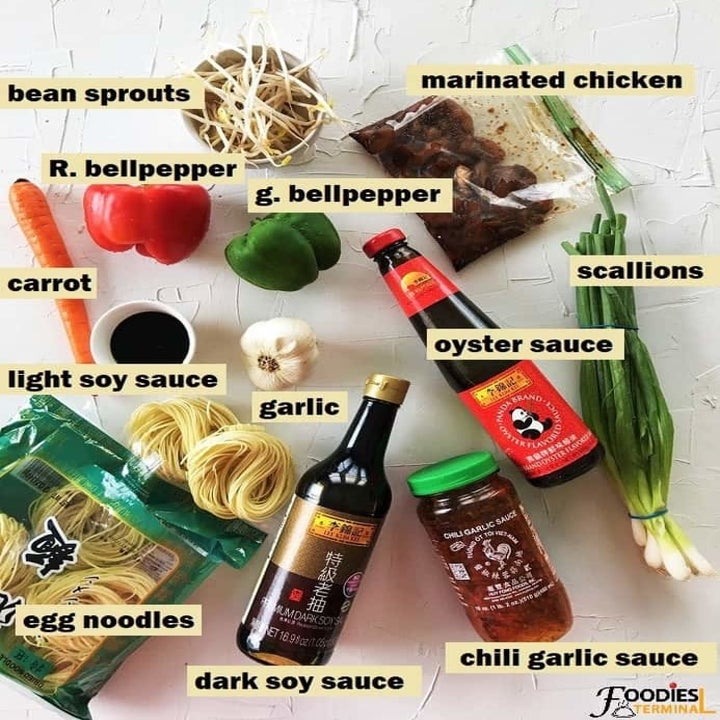 Ingredients for chicken lo mein on a countertop.