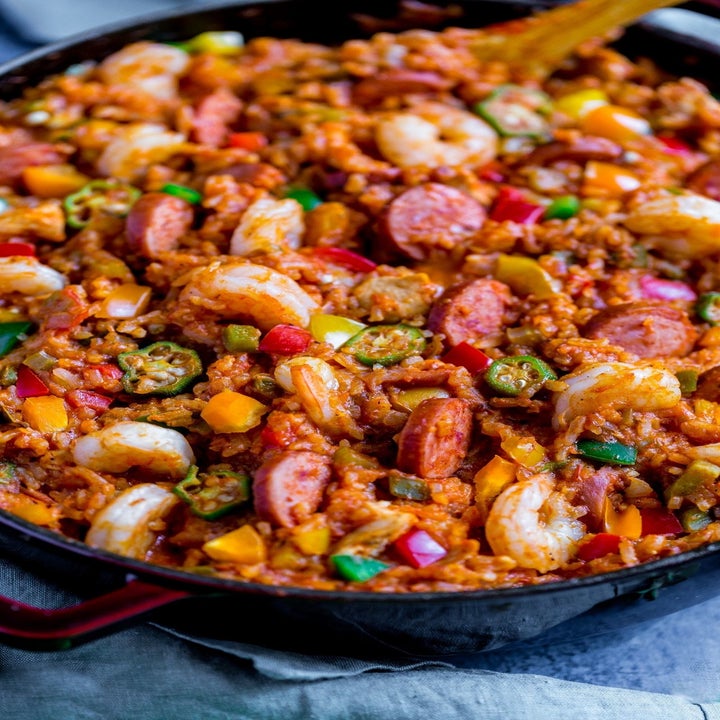 A big skillet of jambalaya made with sausage, shrimp, and chicken.