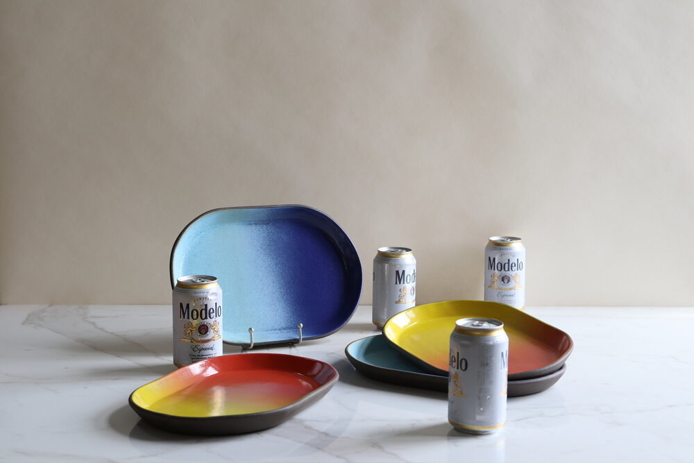 Ombre oval trays with slightly raised edge in blues and oranges