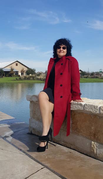 Reviewer wearing the overgarment successful red
