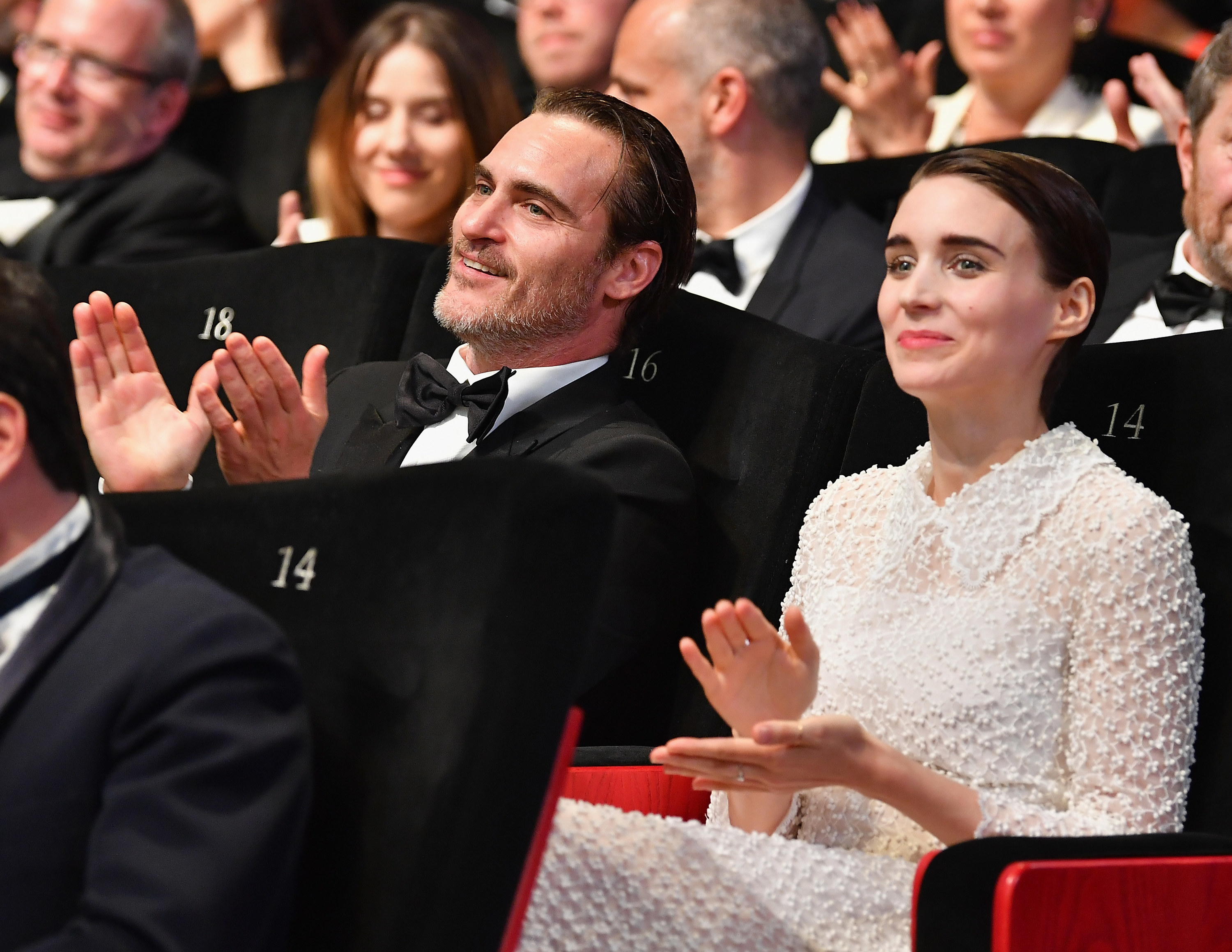 Joaquin Phoenix and Rooney Mara applaud during the Closing Ceremony of the 70th annual Cannes Film Festival at Palais des Festivals on May 28, 2017 in Cannes, France.