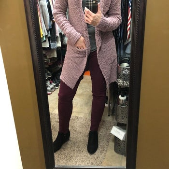 Reviewer wearing cardigan in the shade taro