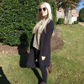 Reviewer wearing black cardigan