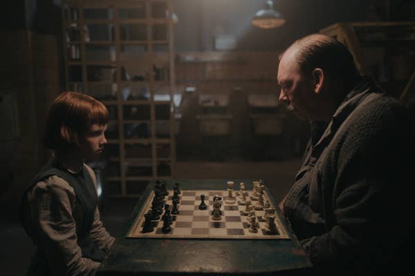 ISLA JOHNSTON as BETH (ORPHANAGE) and BILL CAMP as MR. SHAIBEL in episode 101 of THE QUEEN&#x27;S GAMBIT