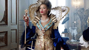 GIF of Beyoncé walking regally and dressed as a queen  