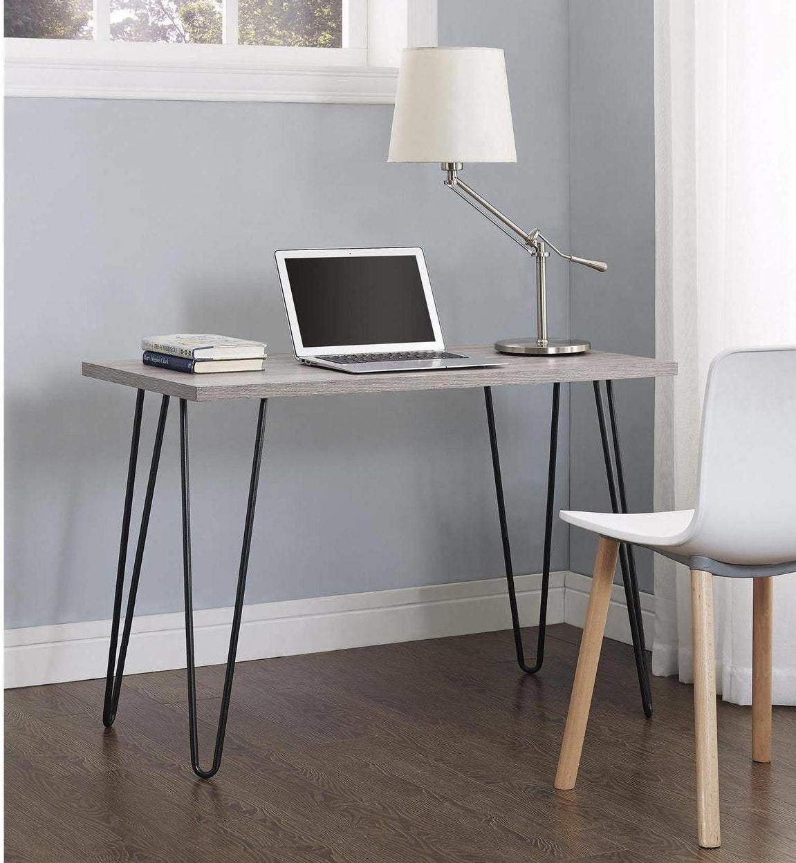 desk with weathered wood finish and metal hairpin legs