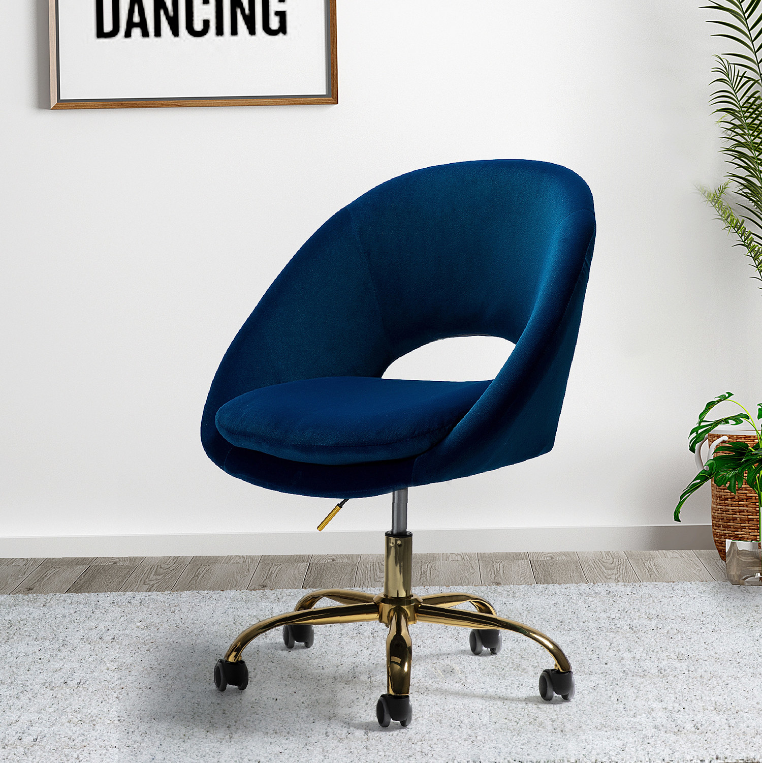 blue upholstered round chair with metal legs with wheels