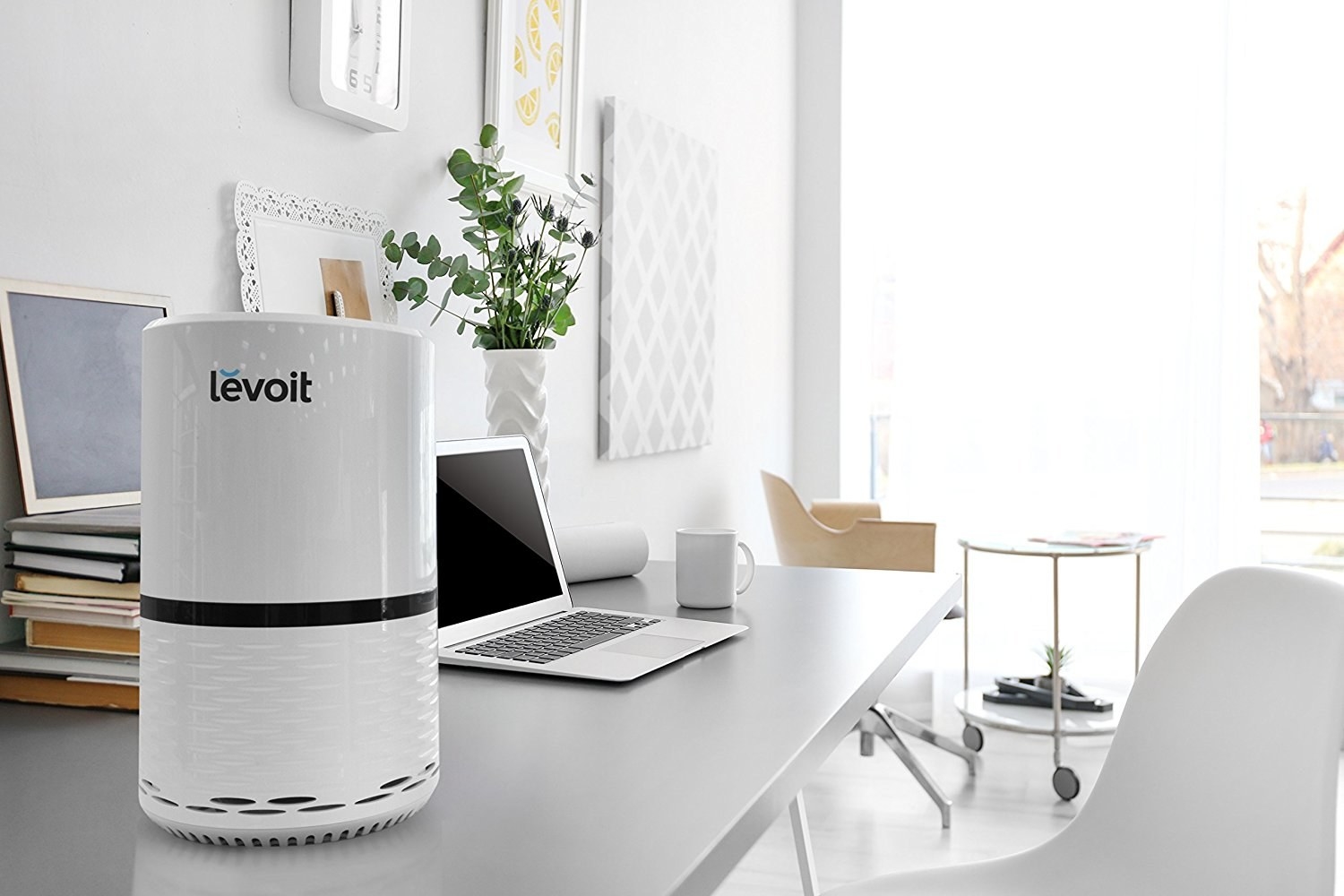 levoit air purifier sitting on a desk