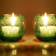 Green candle holders.