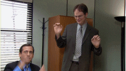 Michael and Dwight from The Office dancing in Michael&#x27;s office.
