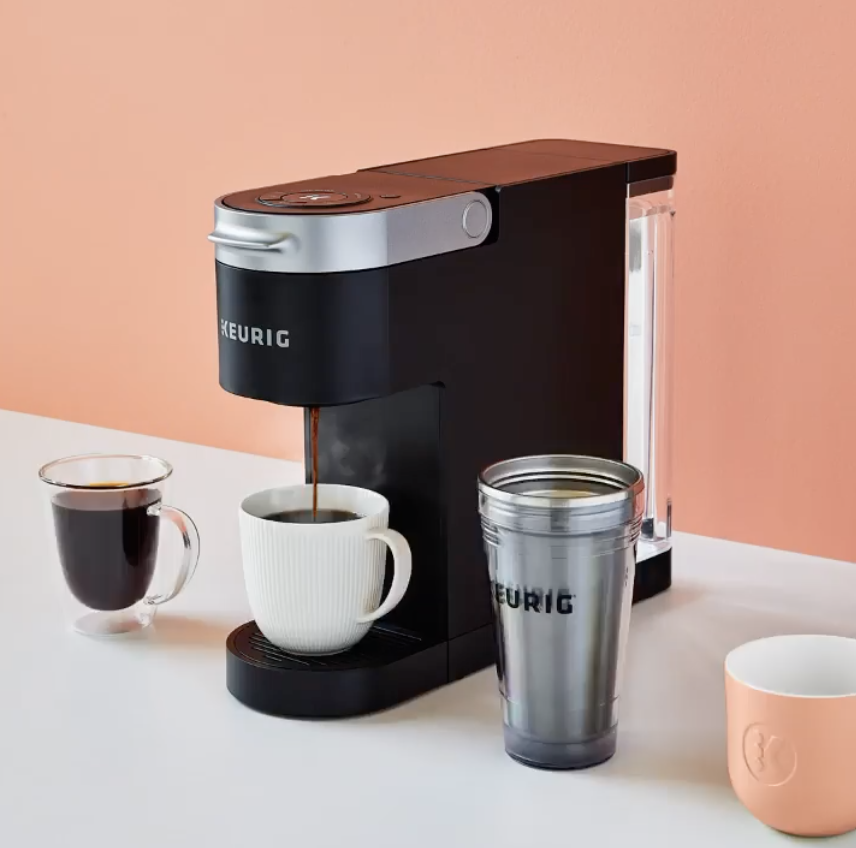 Coffee being brewed into a mug