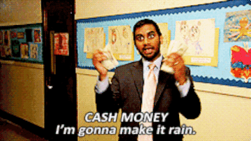 Aziz Ansari throwing money