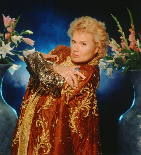 long sequin robe with collar and trim and swirly vine patterns